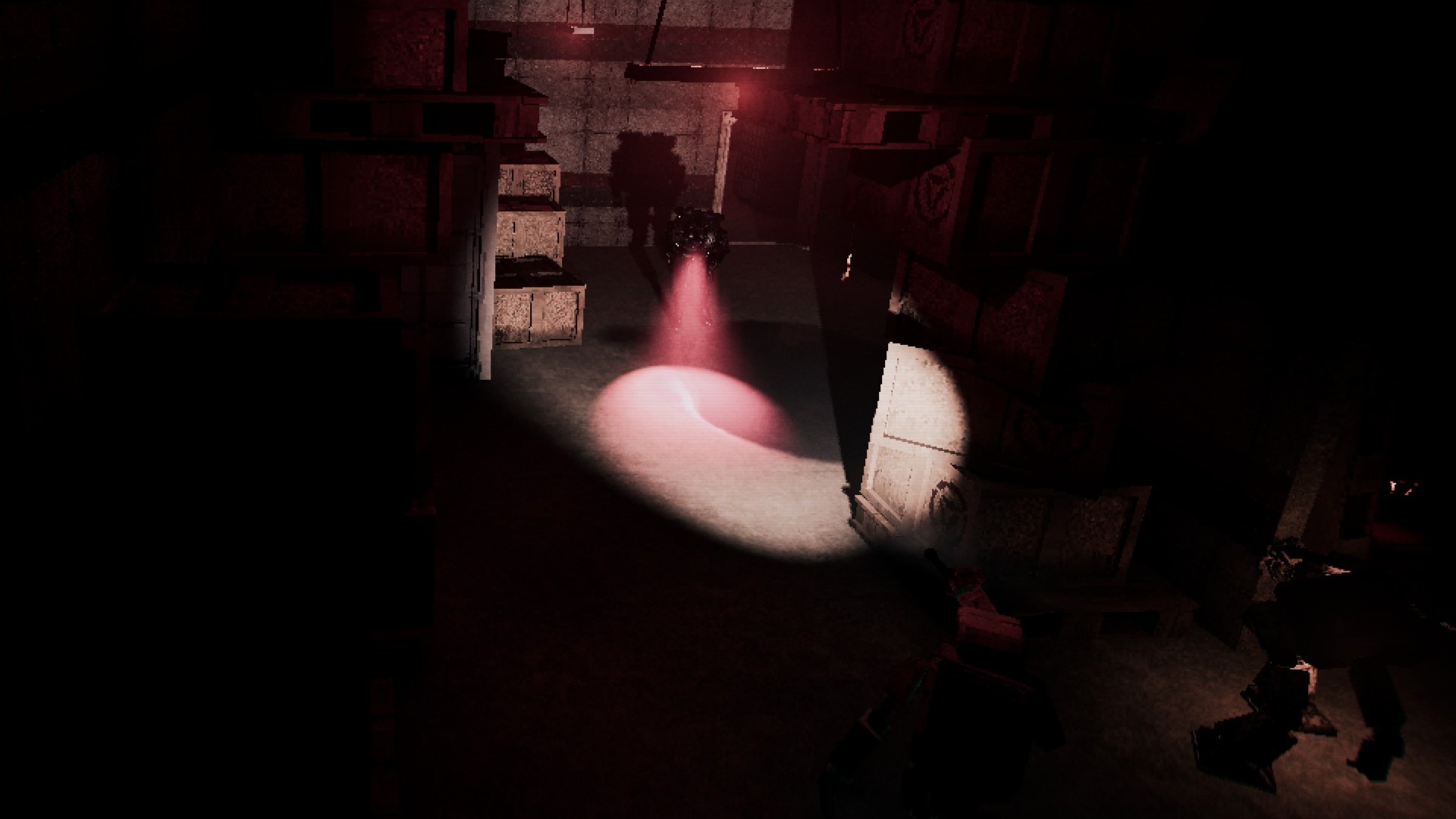 A robot scans the warehouse floor with a red spotlight. The player is hidden just around the corner.